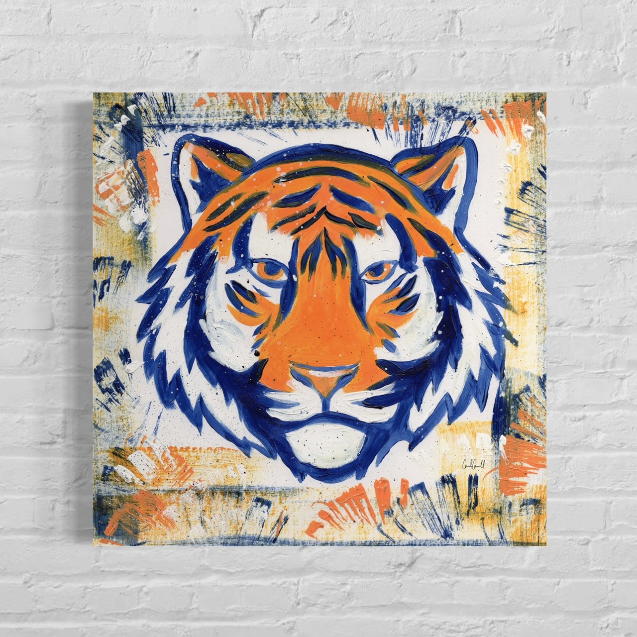 Auburn University Tiger Mascot Canvas Print with orange and blue background on painted white brick wall