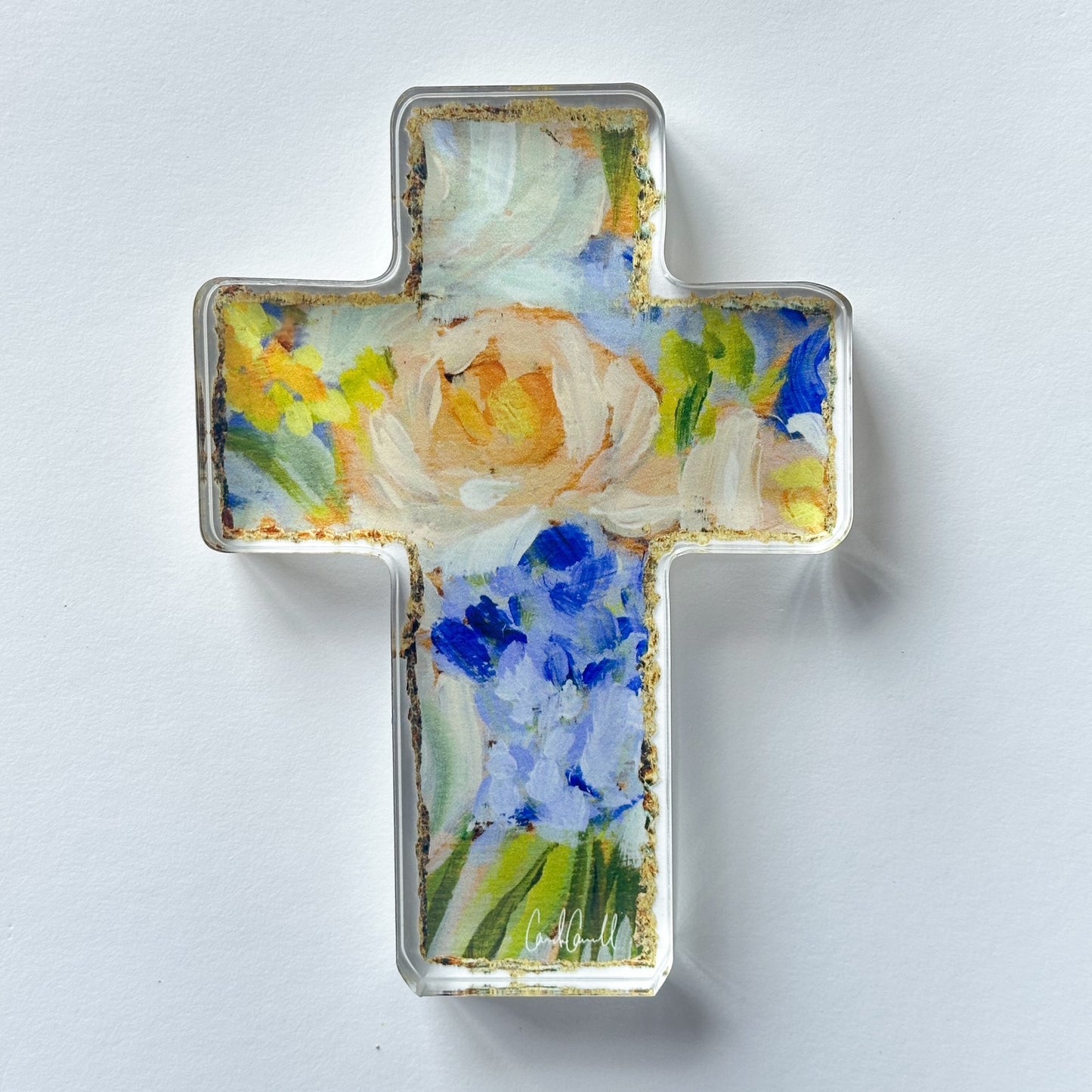 Cross-shaped floral painting.