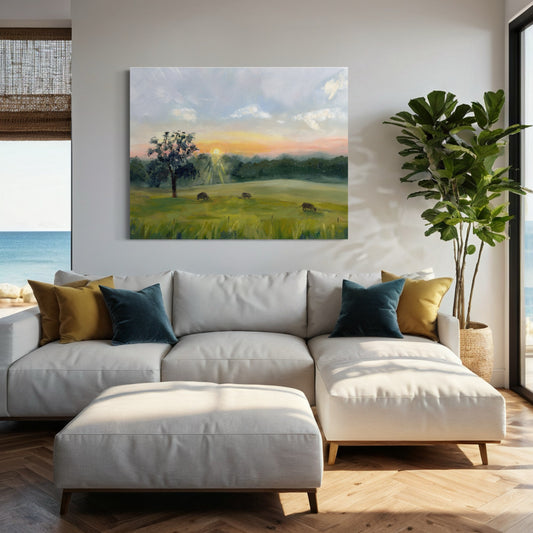 Living room with landscape painting and sofa.