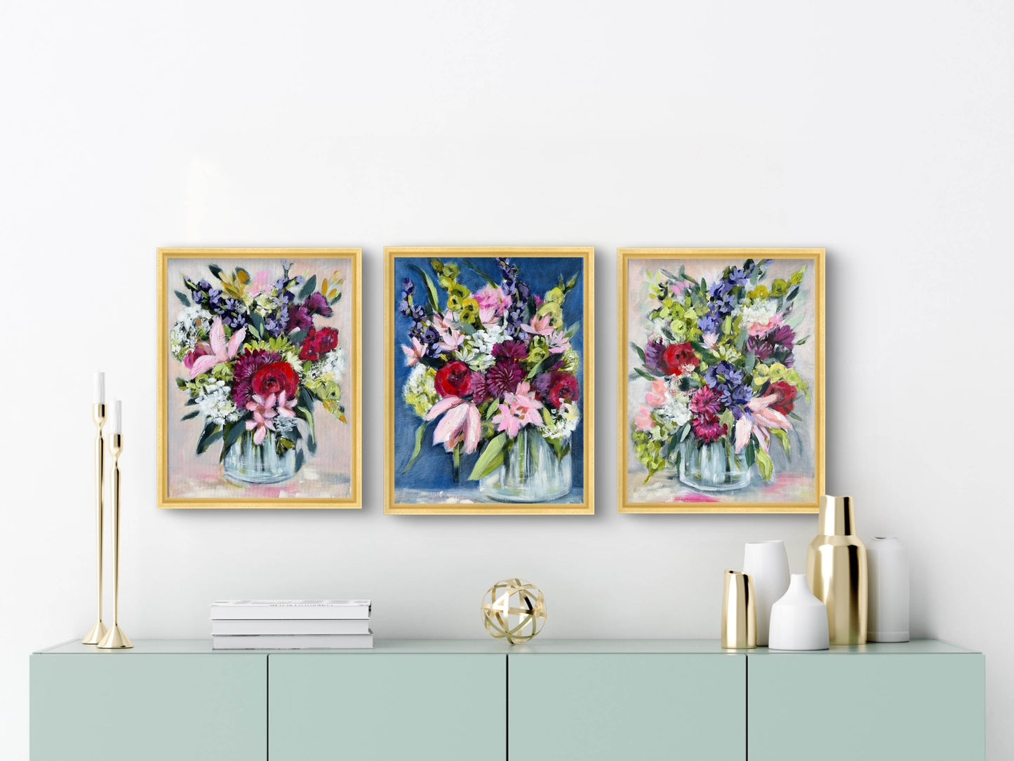 Three framed floral paintings.