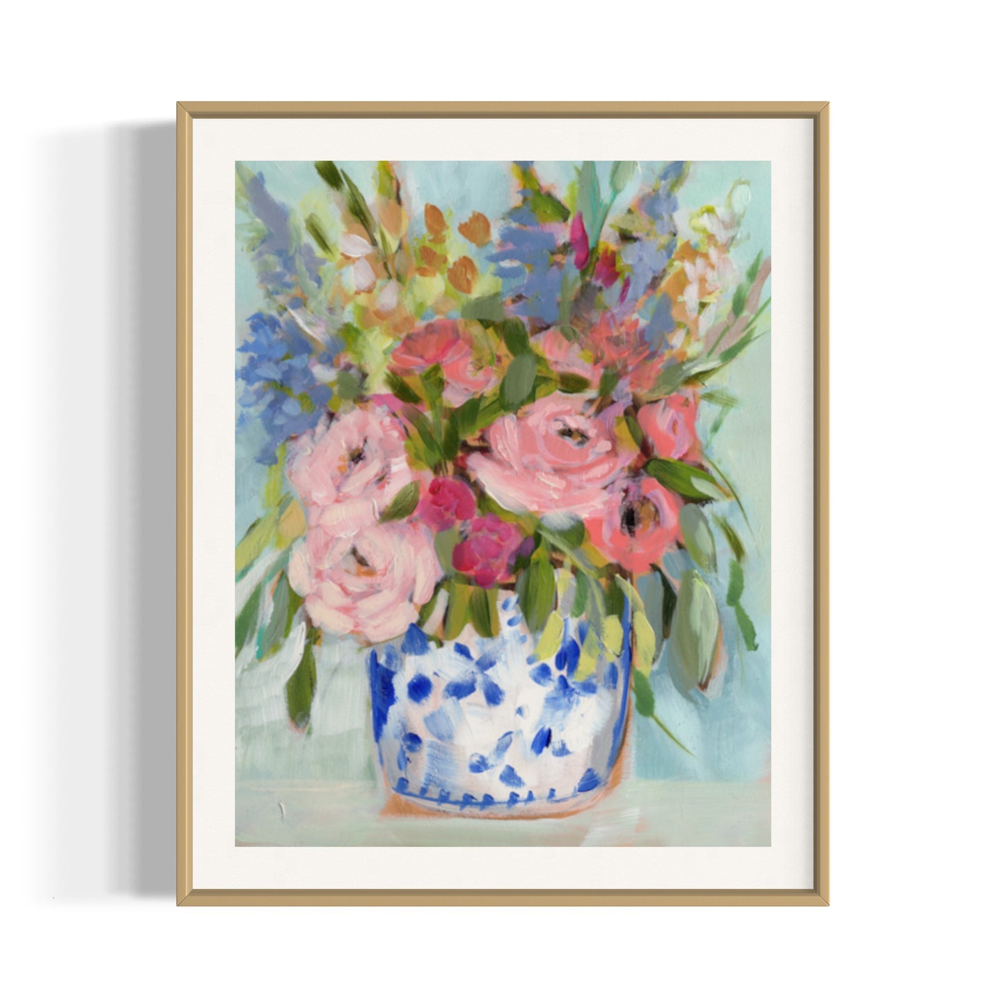 June hydrangeas fine art print. Pink peonies, blue hydrangeas and red accents in ginger jar and mint green background. Framed in gold frame.