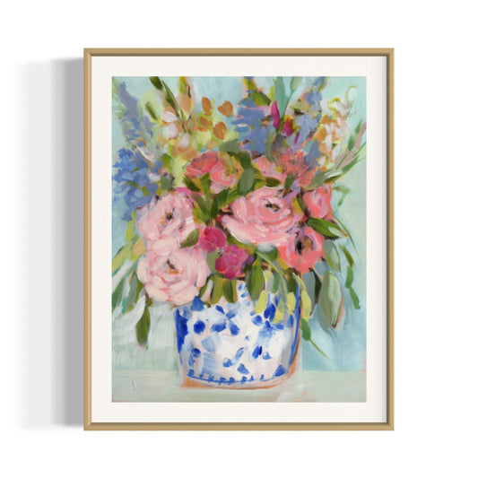 June hydrangeas fine art print. Pink peonies, blue hydrangeas and red accents in ginger jar and mint green background. Framed in gold frame.
