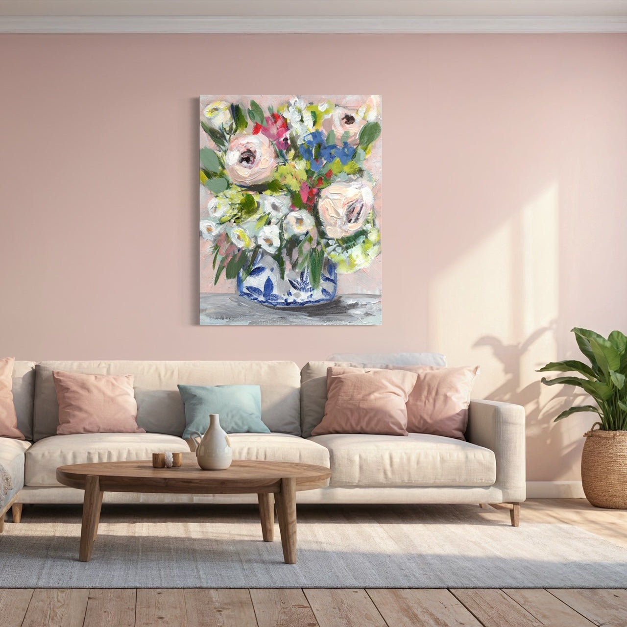 floral art print with pink peonies, white, red and blue flowers on pink background with feminine living space and pink walls and accents