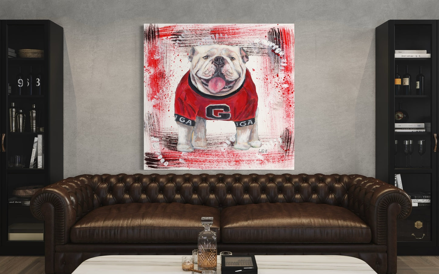 University of Georgia bulldog mascot with red and black background in mancave with leather sofa