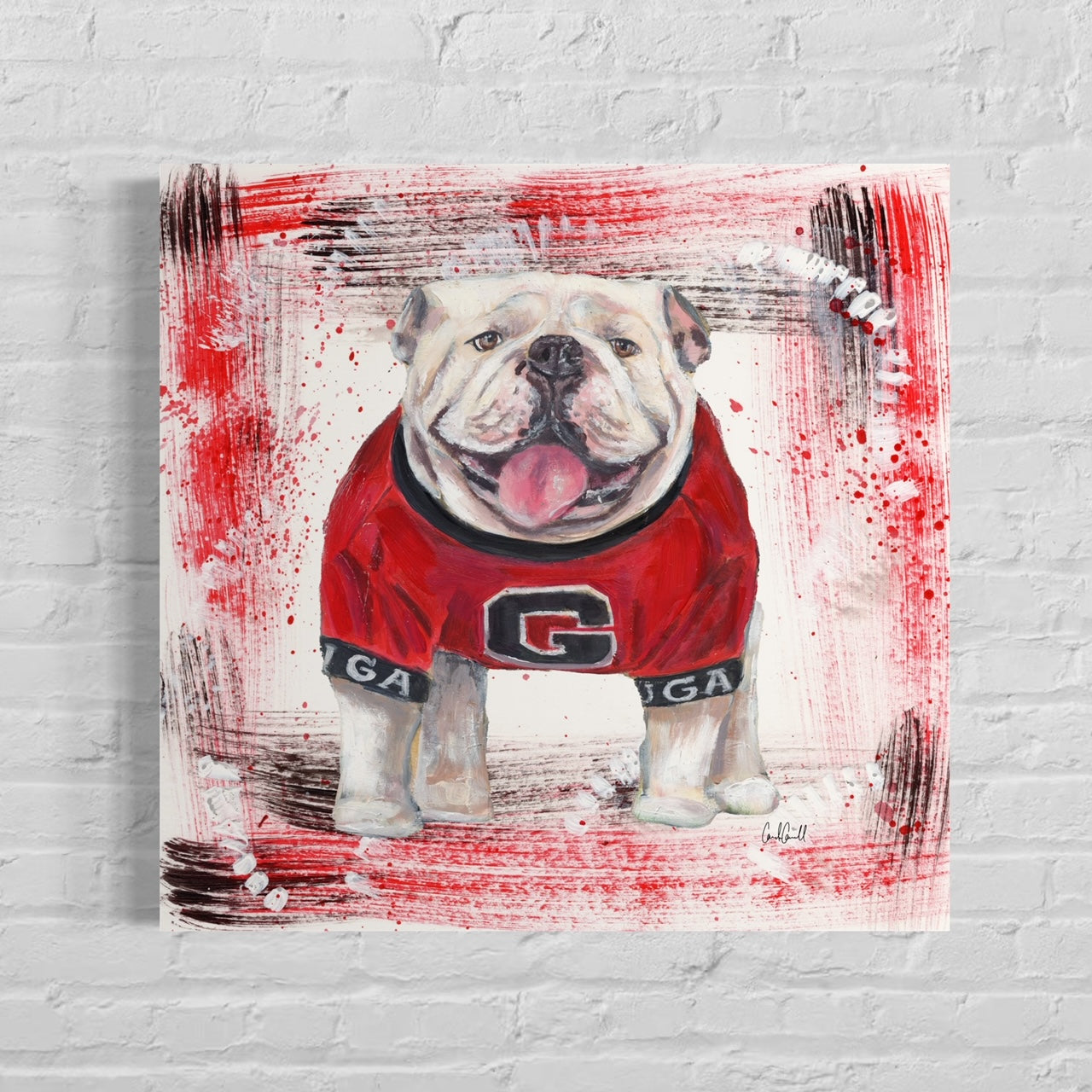 University of Georgia bulldog mascot with red and black background on white brick wall