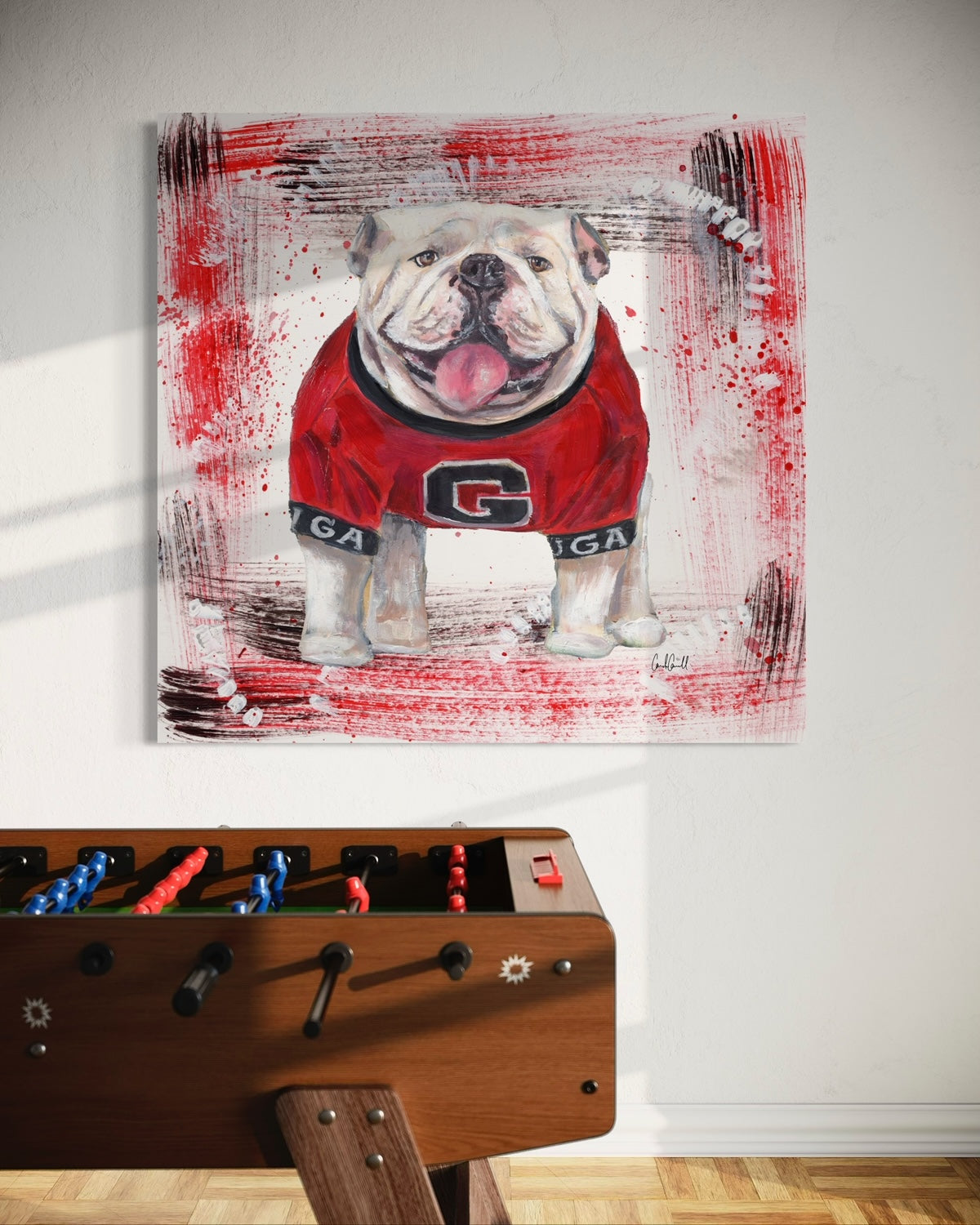 University of Georgia bulldog mascot with red and black background on white gameroom wall