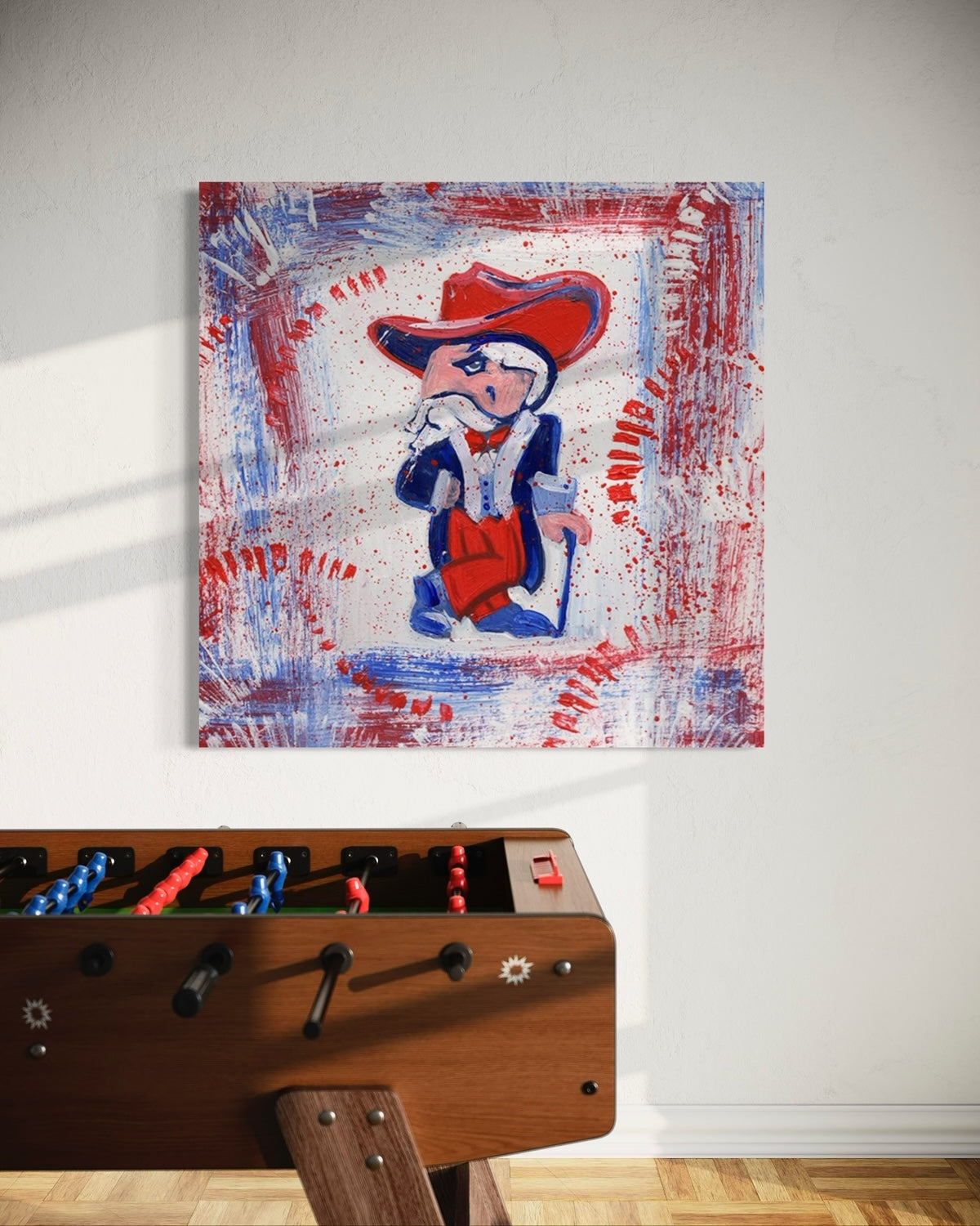 University of Mississippi Mascot Colonel Reb Canvas Print with red and blue background in game room setting