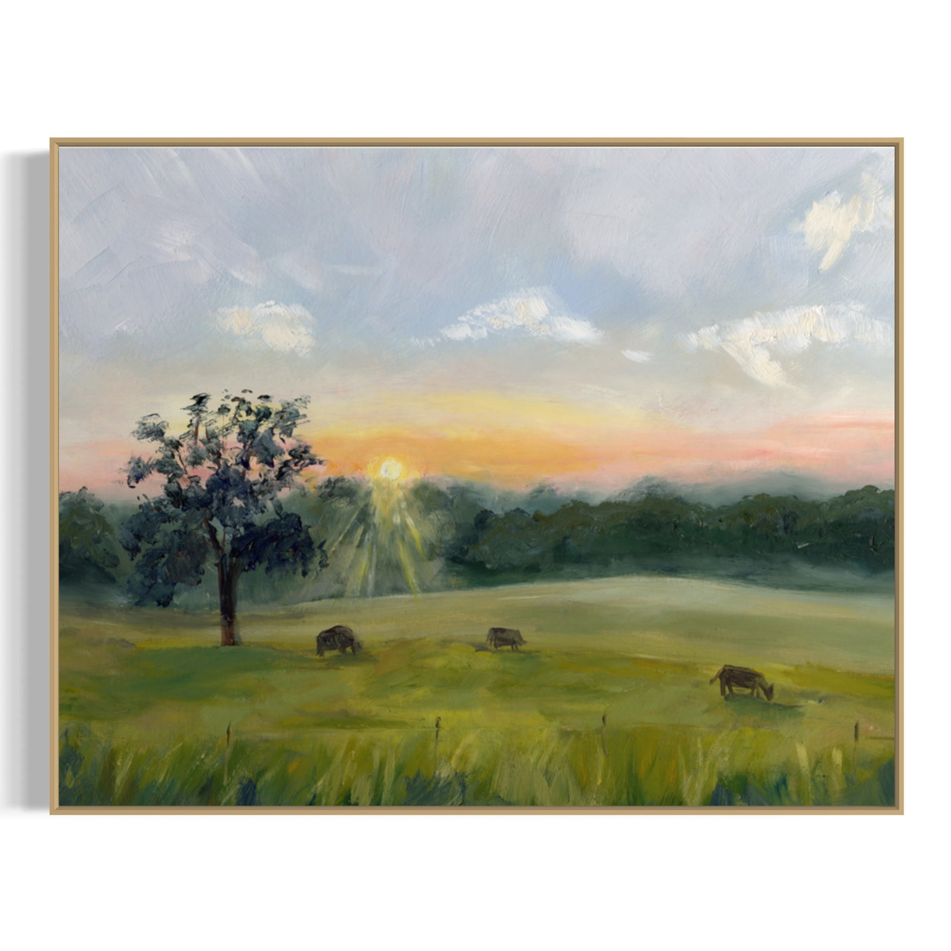 art print of a sunrise over a tranquil field framed in gold minimalist frame on white background