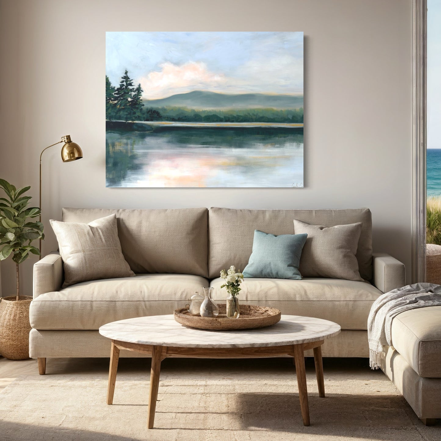 golden hour lake scene canvas print in living room canvas print has shades of green, gold, pink and green
