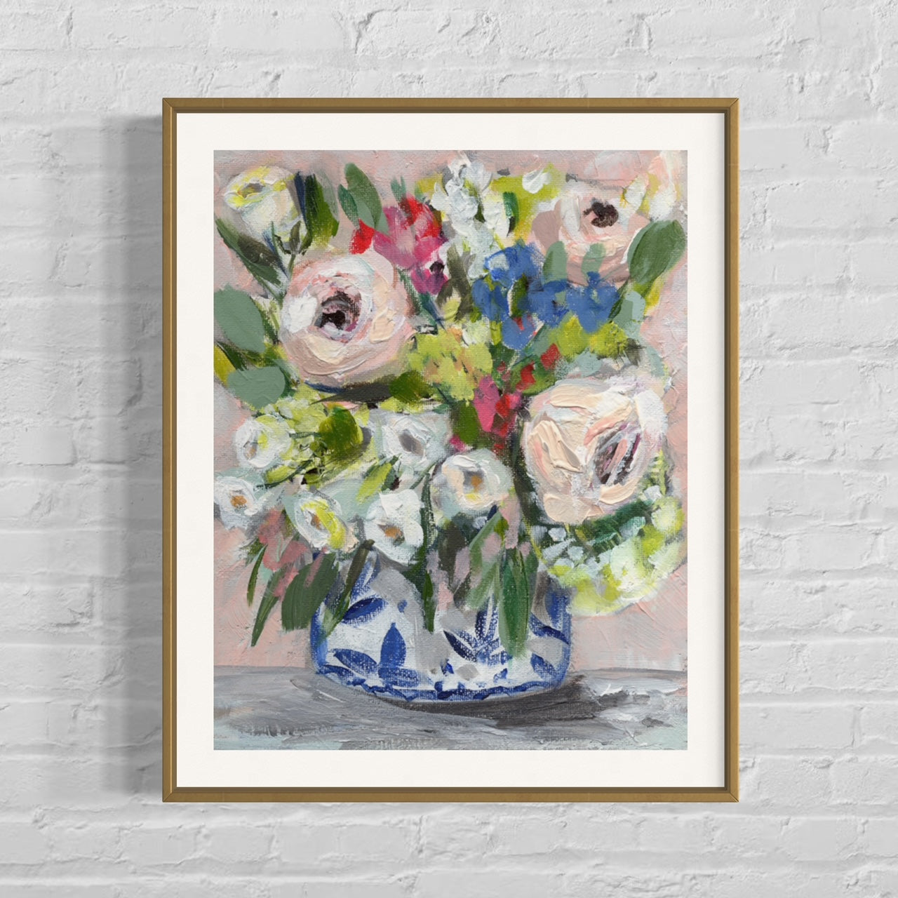 floral art print with pink peonies, white, red and blue flowers on pink background on brick wall
