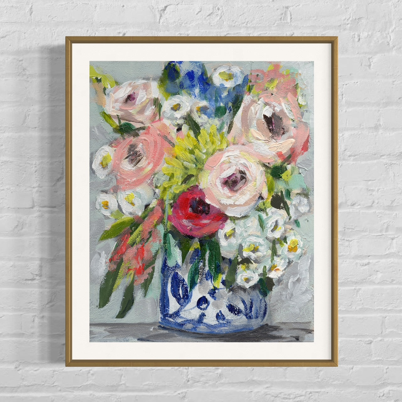 Floral bouquet with colors of pink, red, yellow and white on neutral grey background