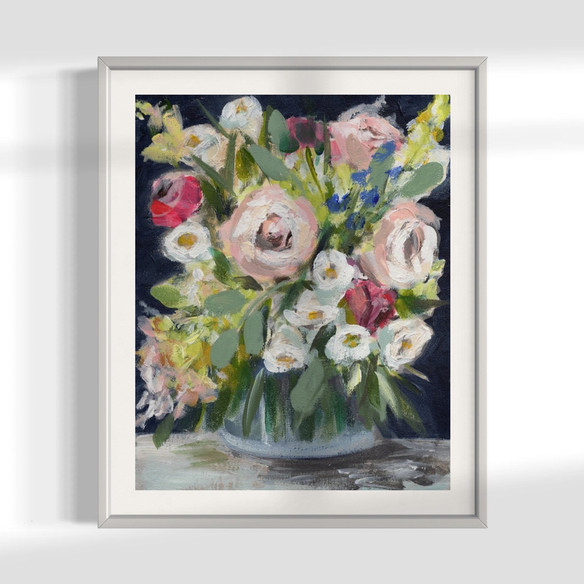 market flowers navy floral art print framed in white on white wall. Pink peonies, red roses, white flowers on navy blue background.
