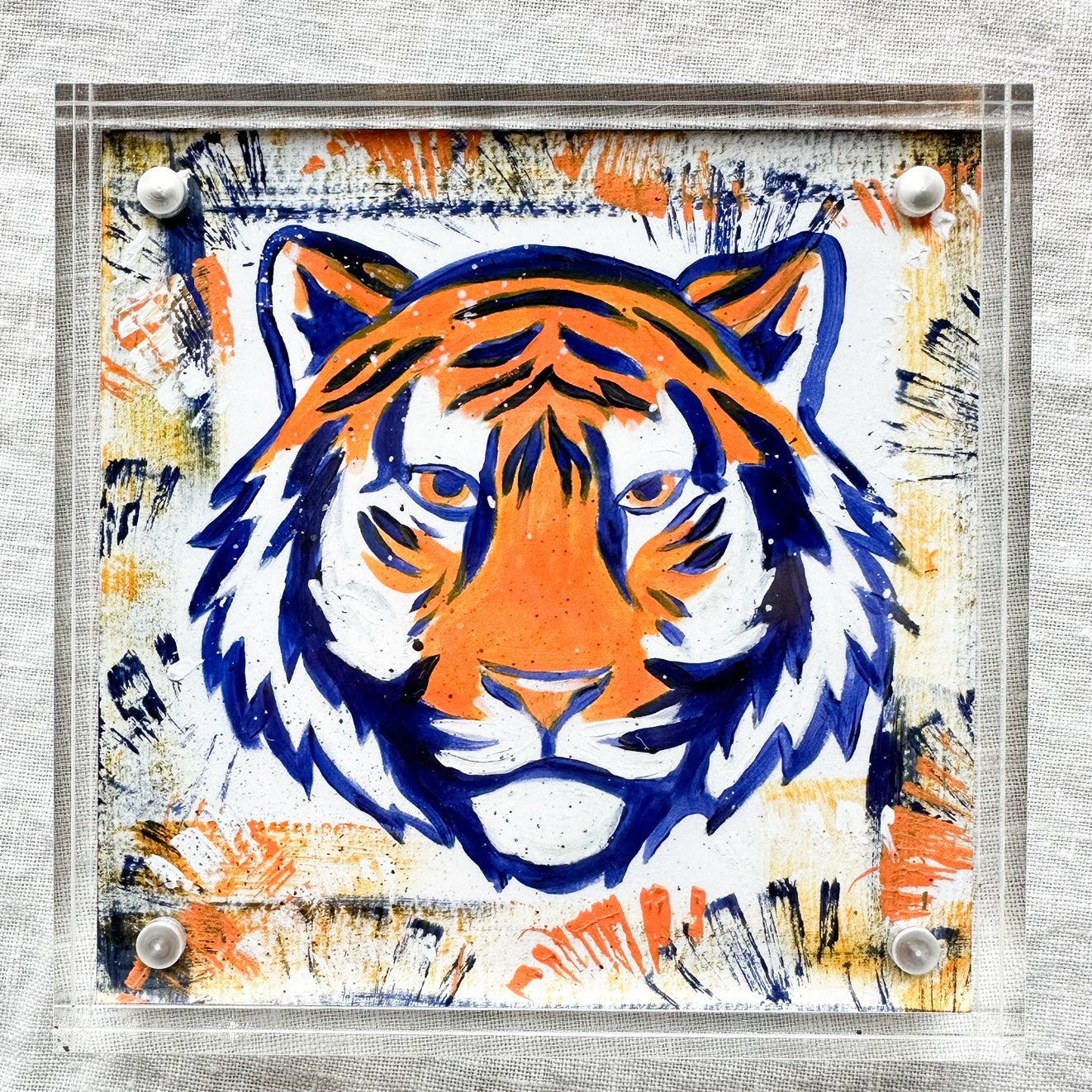 Auburn University Tiger Mascot Art Print with navy and orange background framed in acrylic art frame