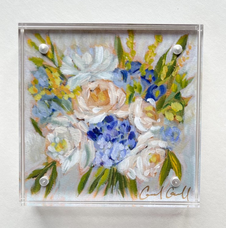 Floral art print with blue and white flowers in acrylic art frame