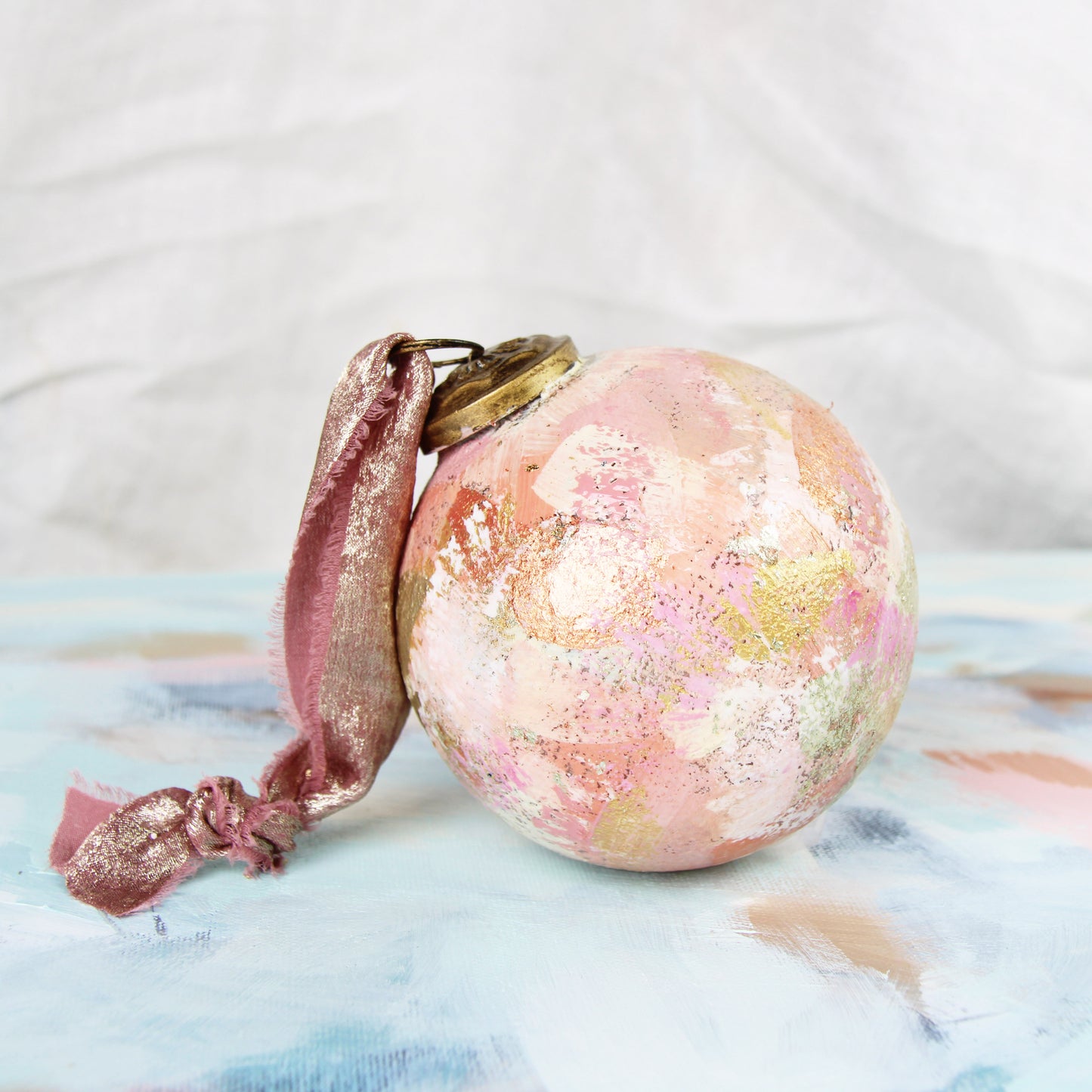 Hand Painted Glass Ornament in Rose Gold