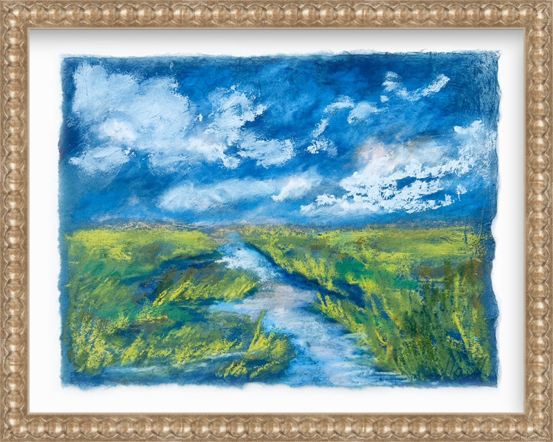 dark blue marsh painting with green grass and river and white clouds framed in silver frame